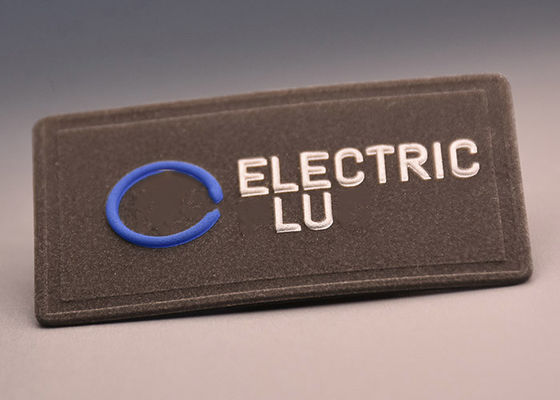 Изготовленные на заказ 3M отражательные выбитые поднятые ярлыки передачи тепла логотипа для одеяния